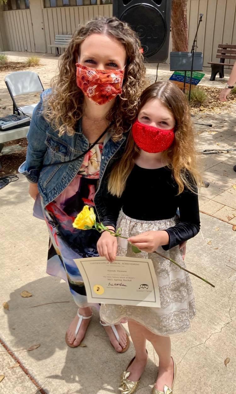 Student with Certificate